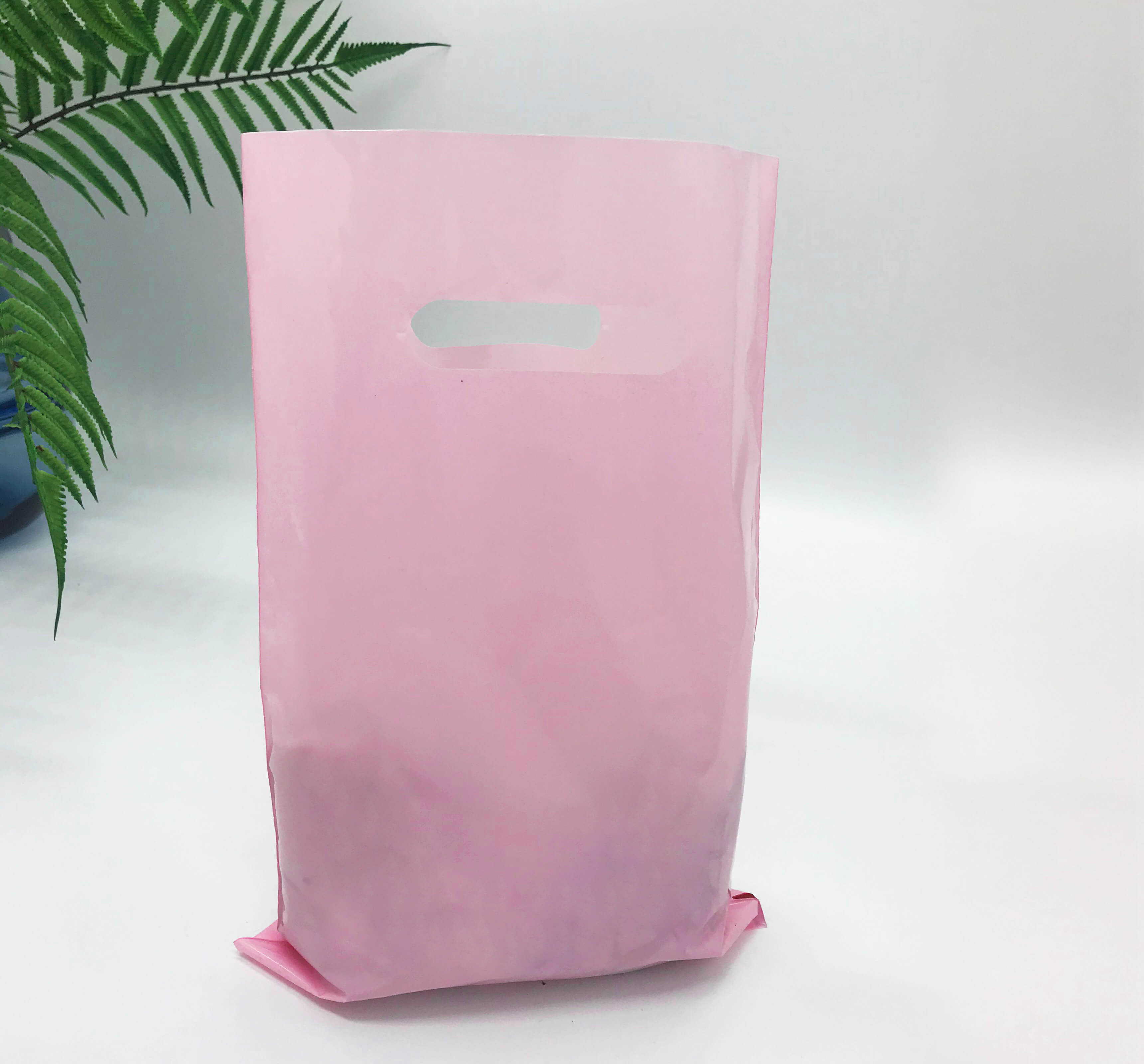 Die cut handle bag  200*300 mm, without printing, LDPE A6, PINK Chernigov Package - Photo 20х30_розовый2+