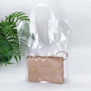 Bags with white loop handle 30х35 cm, without printing, transparent - Photo Bags with white loop handle 30х35 cm, without printing, transparent Bags with white loop handle 30х35 cm, without printing, transparent -Chernigov Package - Photo Bags with white loop handle 30х35 cm, without printing, transparent