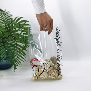 Die cut handle bag “Straight to the heart”, 20х30cm, transparent -Chernigov Package - Фото 20х30_Straight to the heart