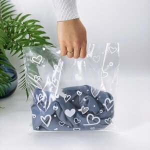 Die cut handle bag “White hearts” 20х30cm, transparent -Chernigov Package - Фото 30х30_White hearts